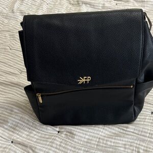 Black Backpack with Gold Accents